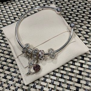 Rhinestone accented silver bangle bracelet